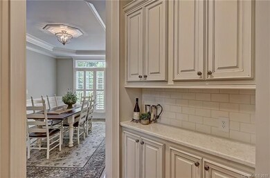 Beautiful butler's pantry features new quartz coun