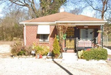 Bungalow featuring a porch