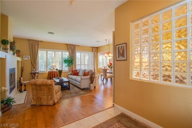 Entryway into the Living Room featuring a fireplac
