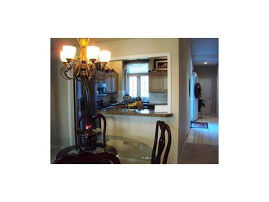 Kitchen has counter perfect for eating or serving 