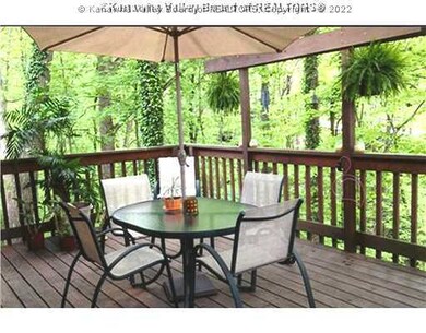 Exterior Back. Peaceful private deck.