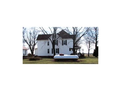 Backyard view:  Propane tanks go with the home, an
