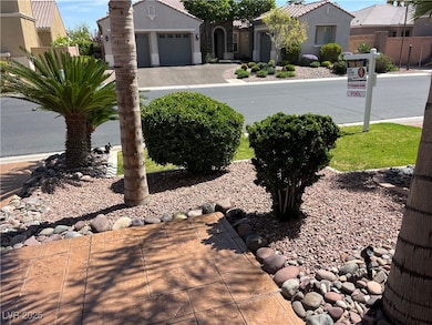 STAMPED CONTRETE AND BEAUTIFUL LANDSCAPING