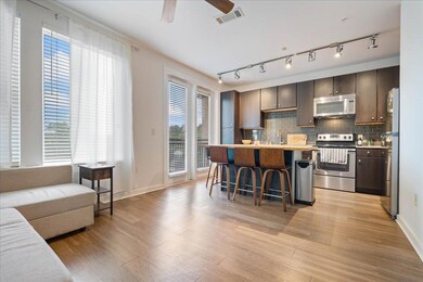 Kitchen with stainless steel appliances, a breakf