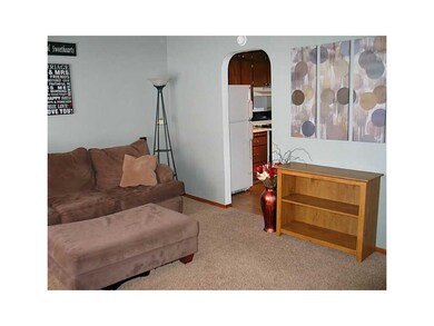 Living Room. Living Room View to Kitchen Archway