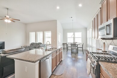 This is a spacious, open-concept living space feat