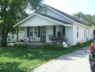 Another view of the front of house with nice big poarch to relax on