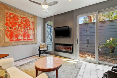 Family room also features electric fireplace with