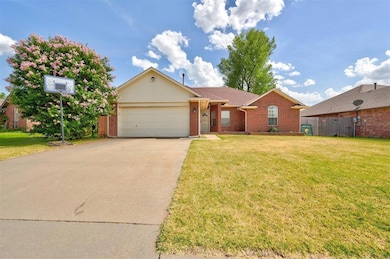 View of front of property with a garage and a fron