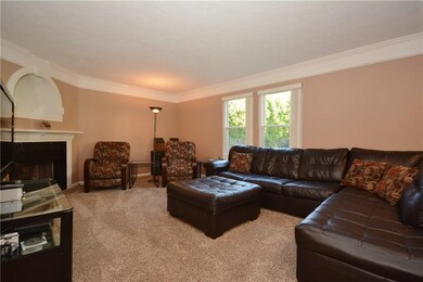 Cozy up in front of the gas fireplace in the famil