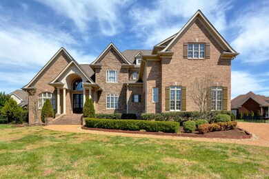 Sitting on a half-acre lot with a side-entry three-car garage, an in-ground saltwater pool, and beautifully-tended landscaping, this stately all-brick home has been maintained to perfection, and it shows. 