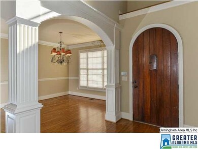 Entry Foyer with arched openings and extensive mol