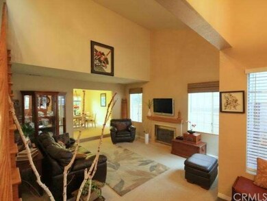 Bright and airy living room with vaulted ceilings 