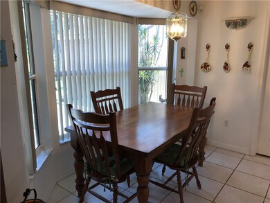 Have a seat at the breakfast nook. Features bay wi