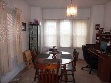 Dining Room. Sunny dining room with a wall of wind