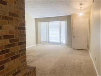 View of the foyer and den/family room.