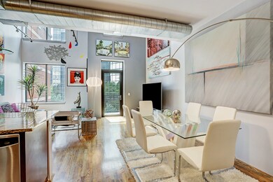 The Dining Area adjacent to the Kitchen. Sleek and