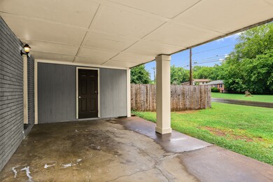 Carport with storage built-in! 
