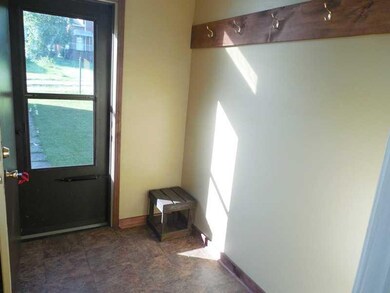Sunroom. A bright and cheerful sunroom serves doub