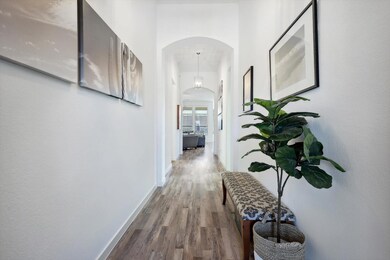 Great long entry way with light floors and lots of natural light
