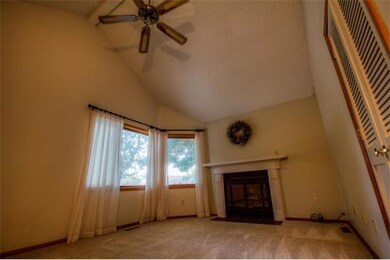 Living Room. Vaulted Living Room w gas log firepla