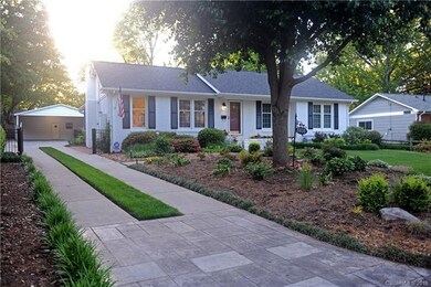 Recently redone concrete driveway with automatic e