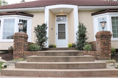 Welcoming staircase leading up the front door with