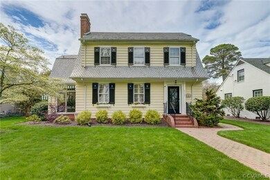 View of front of property featuring a front lawn