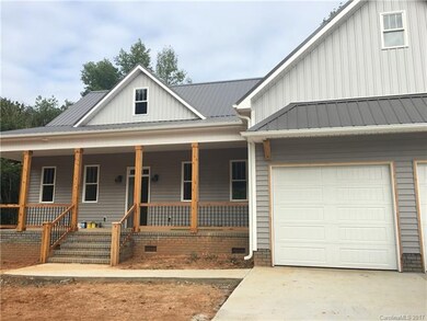 Rocking Chair Front Porch with cedar columns and rails