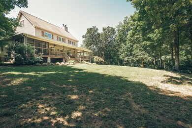 Gorgeous custom built home with rustic, mountain retreat feel. Wooded trails, secluded camping spots with campfire pits, hidden tree house, million dollar views, water springs, the perfect spot for a vegetable garden, and a creek all tucked away.