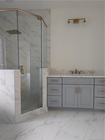 One of Two Master Bath Lavatories