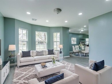 Living area with view or open concept to dinning a
