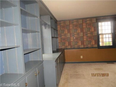 Living Room. Built-in Bookshelves This room has a fireplace too