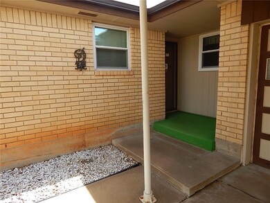 Welcome home to this cute covered front porch and 