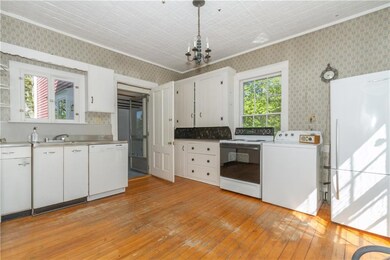 Another view of the kitchen looking...
