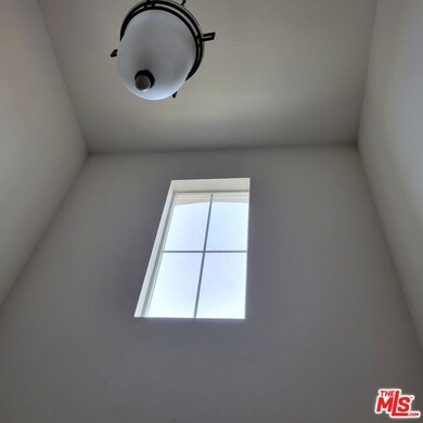 Window above the stairs