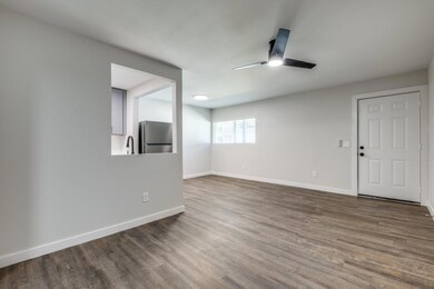 Spare room with hardwood / wood-style flooring, ce