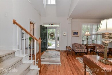 Very open foyer with hardwood floors