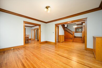 Living room looking to entry and dining room. Ther