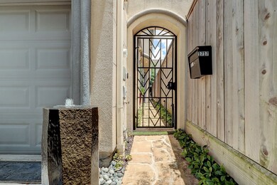Flag stone walk way greet guests at entrance with water feature -
