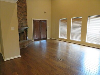 Huge living area with nice wood floors