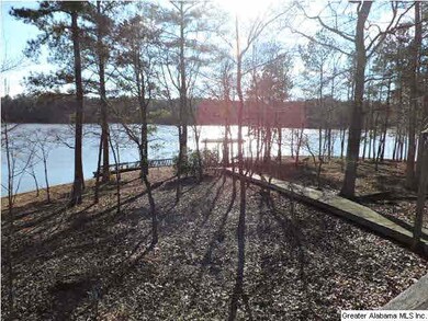 Sidewalk to Gazebo at water.