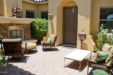 Gated pavered courtyard