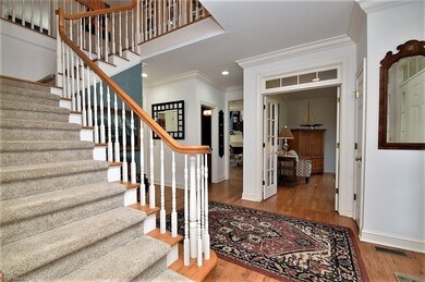 Gracious foyer with amazing light, wood floors and