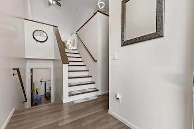 Brand new hand rails and tastefully painted stairs and tread.