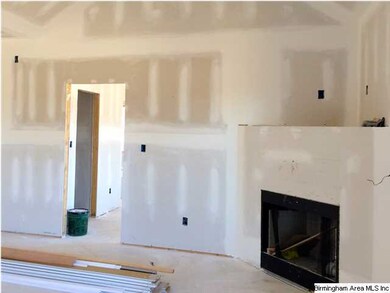 Large great room with vaulted ceiling.