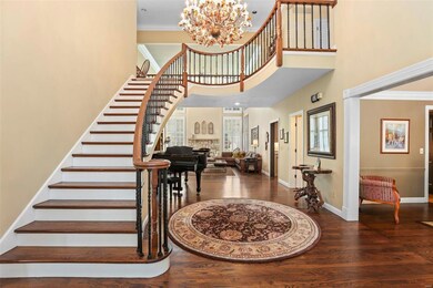 Grand 2-story entry foyer.