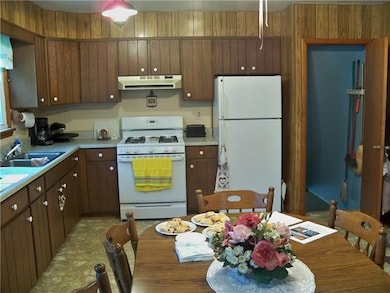 Kitchen Dining Room; door to Basement