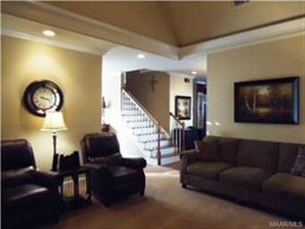 Huge great room with vaulted ceilings, crown moldi