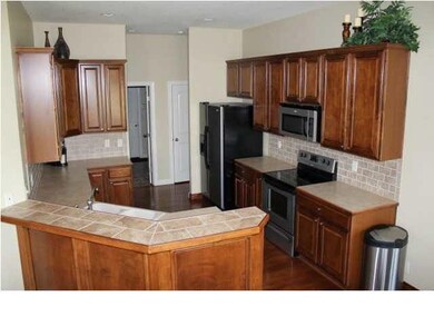 Large kitchen with eating bar, full pantry and mai